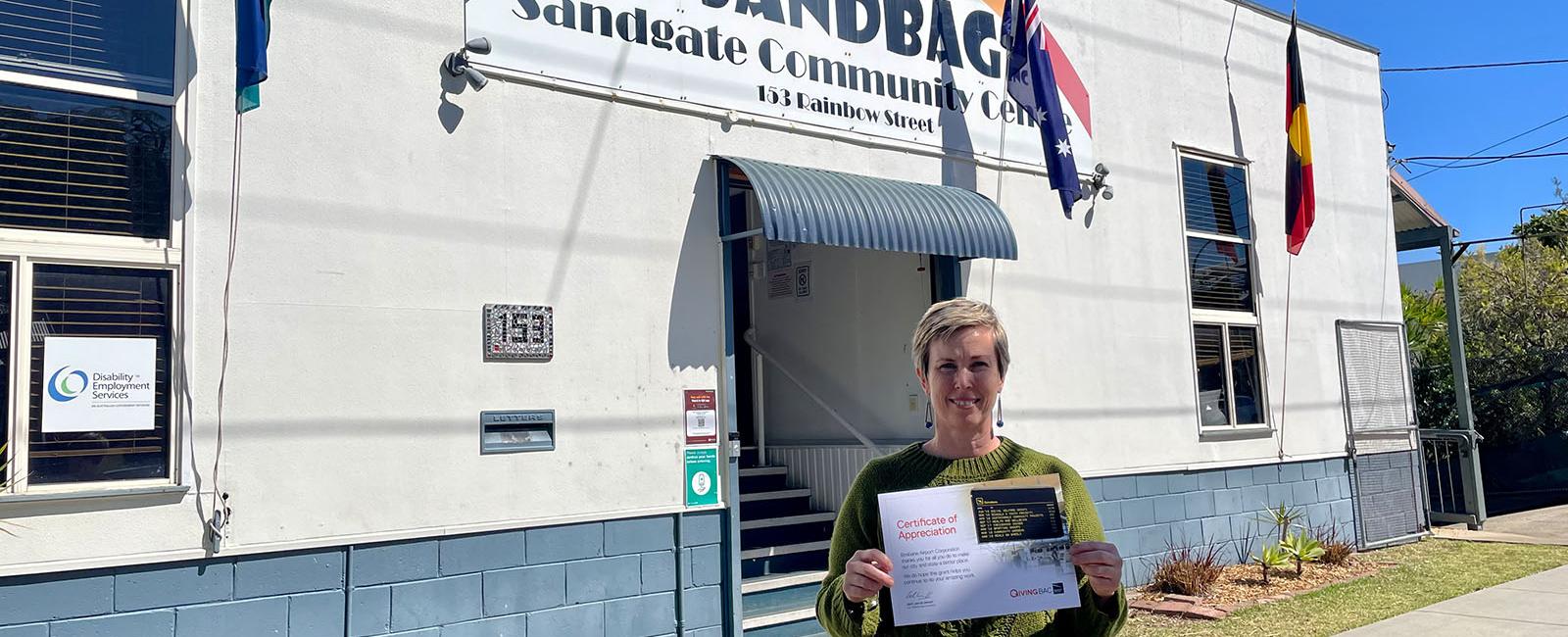 SANDBAG's Erin Williams standing in front of the Sandgate Community Centre