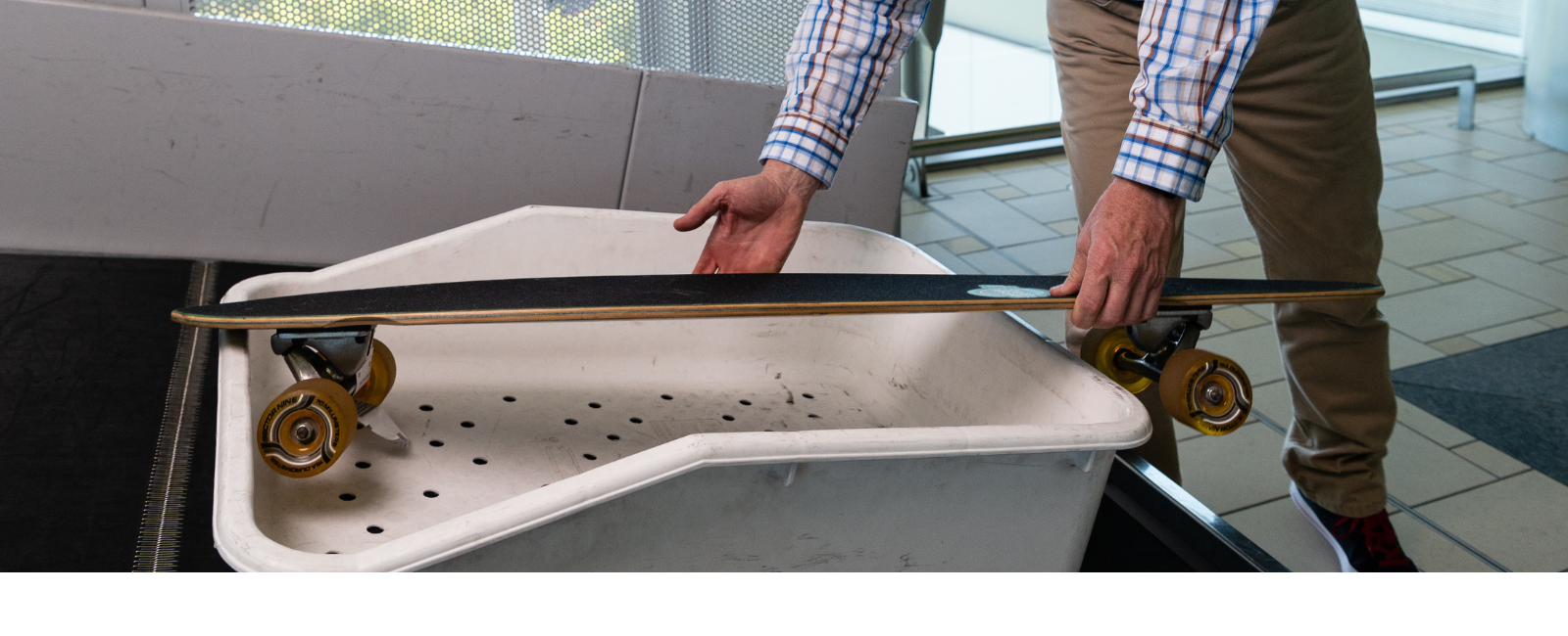 Travelling with oversized luggage - travelling with a longboard