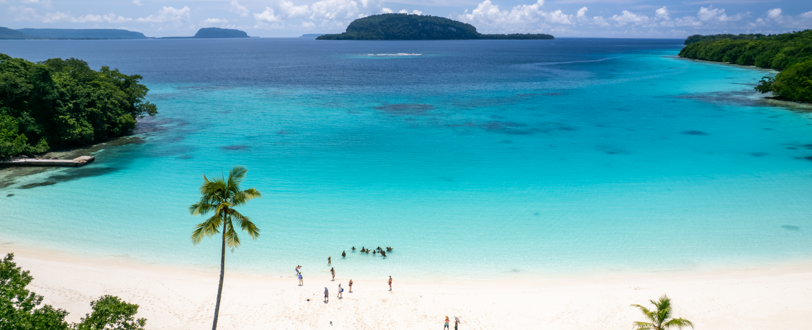 People on Champagne Beach, Santo, Vanuatu