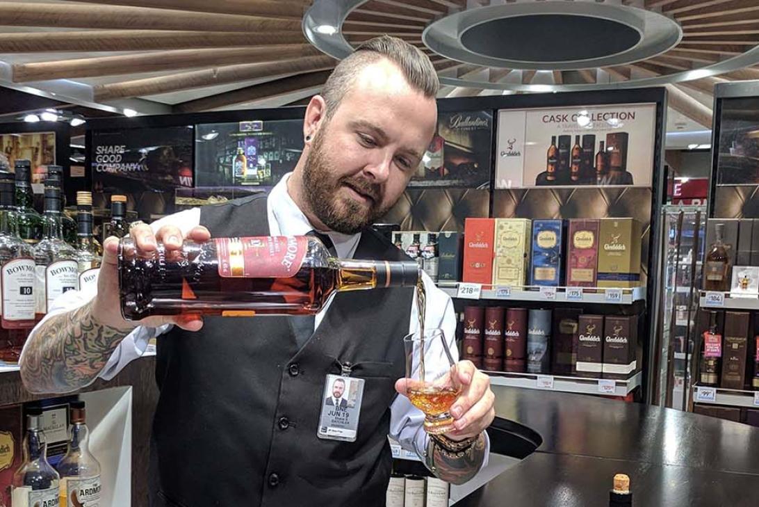 Shane Batchler, whisky specialist at Lotte Duty Free’s tasting bar, Brisbane Airport